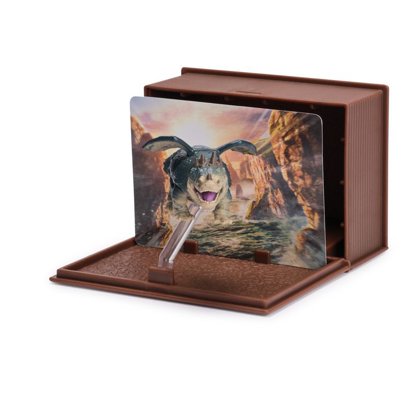 Kako izuriti svojega zmaja figurica s kartami v knjigi zmajev