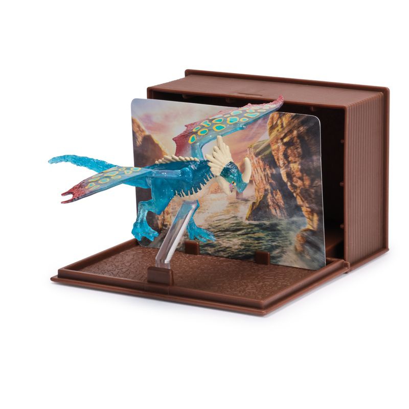 Kako izuriti svojega zmaja figurica s kartami v knjigi zmajev